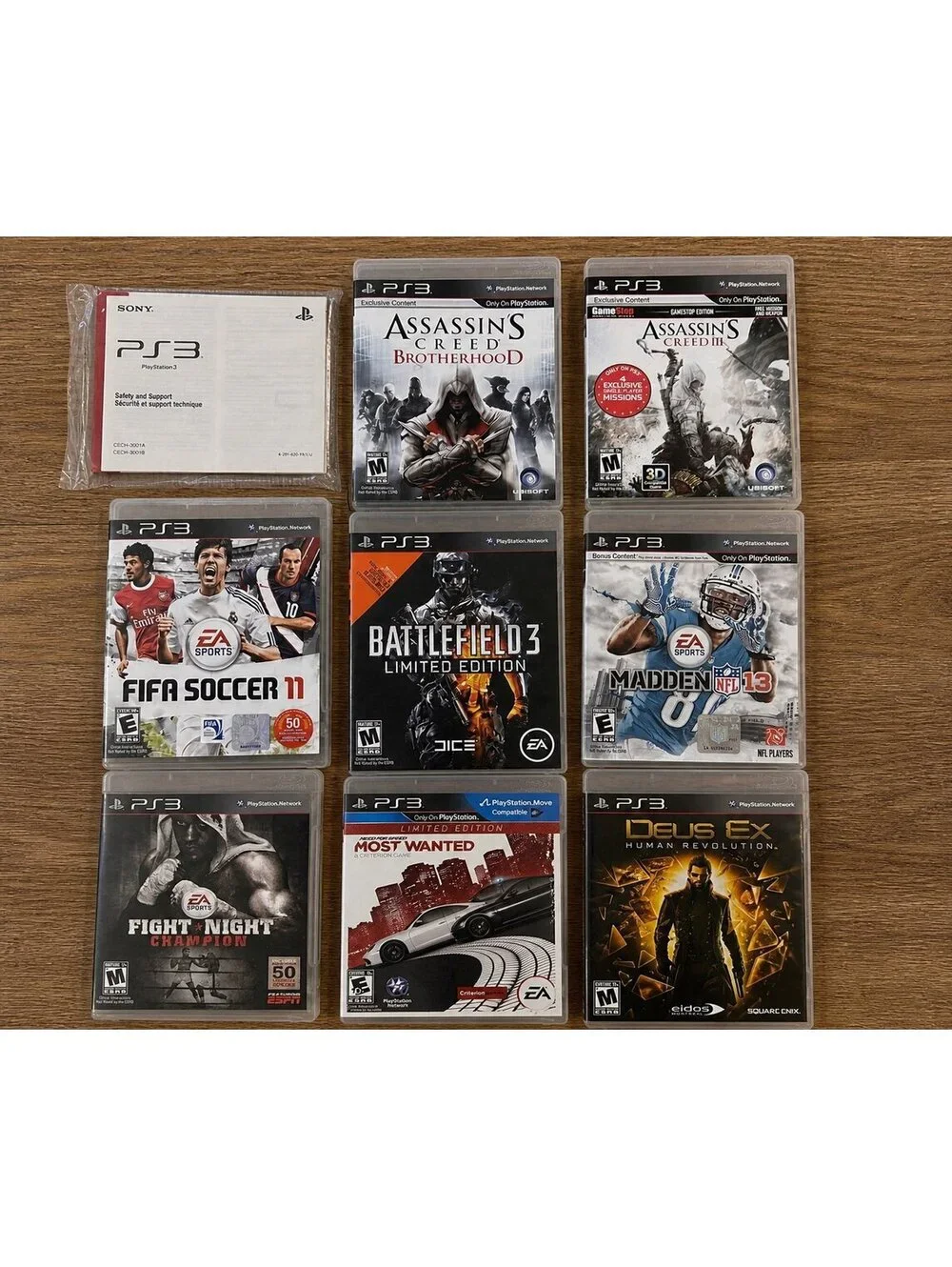 PS3 Game Lot 8 Games Assassin’s Creed Madden NFS Deus Ex Fight Night